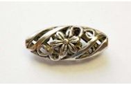 Полая резная бусина овальная с цветком 9,5x23mm